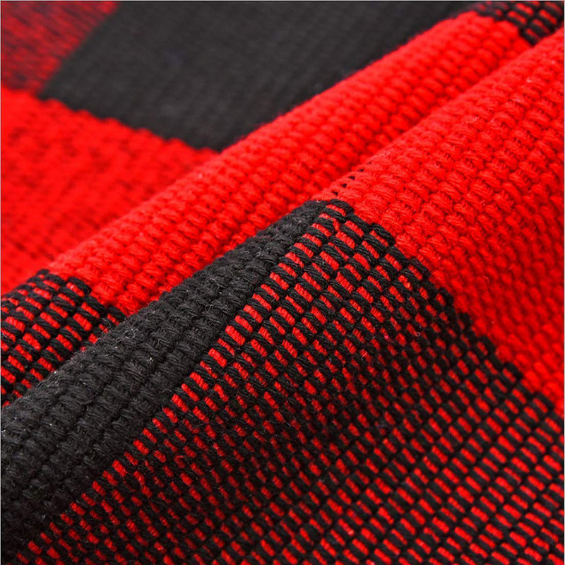 Black and red plaid layering rug